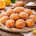 Piatto da portata con sopra Frittelle di riso di San Giuseppe