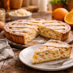 Pastiera napoletana su tavolo di legno rustico